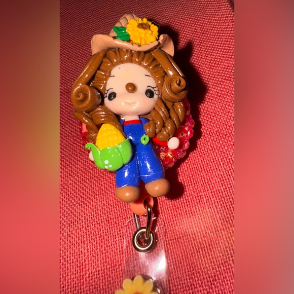 Charming Doll Keychain with Blue Overalls and Brown Hair - Picture 4 of 6